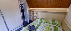 Postel nebo postele na pokoji v ubytování Vila Anna Wellness
