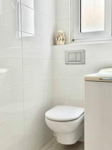Koupelna v ubytování Moderno y amplio apartamento en el centro de Roses