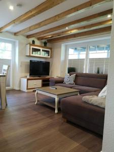 TV a/nebo společenská místnost v ubytování Ferienwohnung Ankerplatz in Schlagsdorf auf Fehmarn