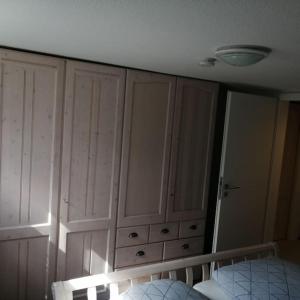 Postel nebo postele na pokoji v ubytování Ferienwohnung Ankerplatz in Schlagsdorf auf Fehmarn