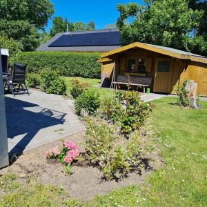 Zahrada ubytování Ferienwohnung Ankerplatz in Schlagsdorf auf Fehmarn + 16 fotografií