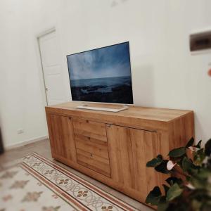 TV a/nebo společenská místnost v ubytování Piazza Vittoria Apartment