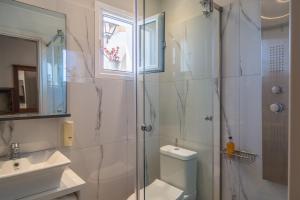 Kúpeľňa v ubytovaní Aris Apartments