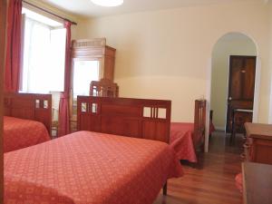 Postel nebo postele na pokoji v ubytování Hostal Ayestaran I