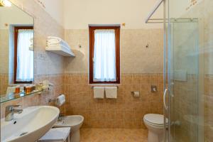 Koupelna v ubytování Hotel Romantic