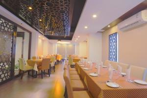 A restaurant or other place to eat at Holy Inn Sylhet