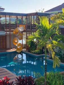 Bazén v ubytování Mana-An Lake Hill Resort Apartment nebo v jeho okolí
