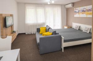 Ένα ή περισσότερα κρεβάτια σε δωμάτιο στο Apartment Titanic 3