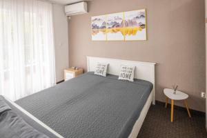 Ένα ή περισσότερα κρεβάτια σε δωμάτιο στο Apartment Titanic 3