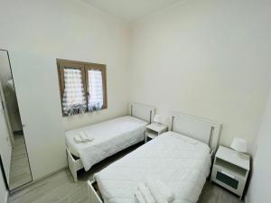Posteľ alebo postele v izbe v ubytovaní Villa Maresa