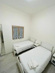 Posteľ alebo postele v izbe v ubytovaní Villa Maresa