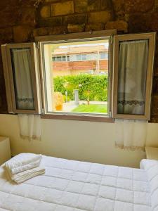 Posteľ alebo postele v izbe v ubytovaní Villa Maresa