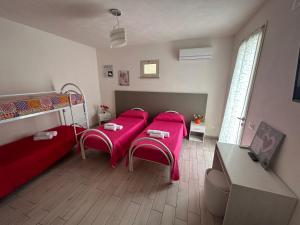 Postel nebo postele na pokoji v ubytování B & B Da Rosa