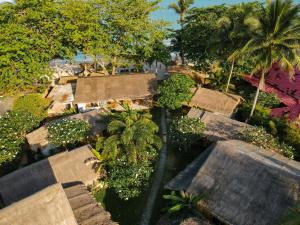 Ein Garten an der Unterkunft Margarita Beach