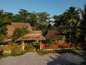 Ein Garten an der Unterkunft Margarita Beach