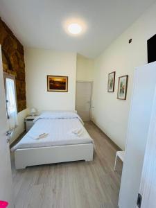 Posteľ alebo postele v izbe v ubytovaní Villa Maresa