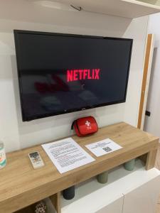 A television and/or entertainment centre at San Ciro's apartment