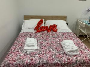 A bed or beds in a room at San Ciro's apartment