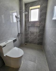 Koupelna v ubytování Romano Hotel
