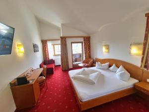 Das Alpin - Hotel Garni Guesthouse 객실 침대