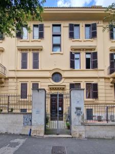 a building with a gate in front of it at San Pietro Roma Suite in Rome