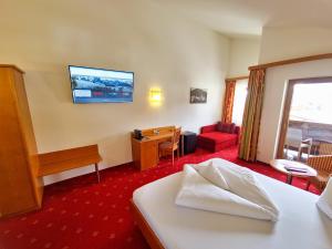 Das Alpin - Hotel Garni Guesthouse 객실 침대