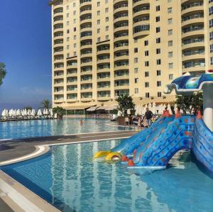 Bazén v ubytování Alanya gold city hotel main building 3 bedroom apartment nebo v jeho okolí