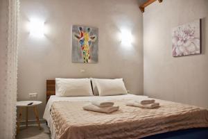 Ένα ή περισσότερα κρεβάτια σε δωμάτιο στο Petritis Villas B +37 φωτογραφίες