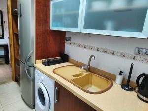 Kuchyňa alebo kuchynka v ubytovaní Piso acogedor en Málaga