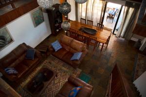 an overhead view of a living room and dining room at Villa Castellos in Inhambane