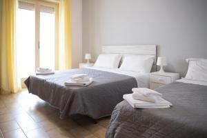 Postel nebo postele na pokoji v ubytování Hotel Helvetia