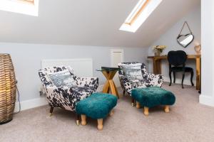 Maes Bach Boutique GUEST HOUSE TOWN CENTRE的休息区