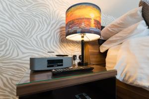 Maes Bach Boutique GUEST HOUSE TOWN CENTRE客房内的一张或多张床位