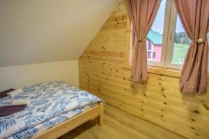 Letto o letti in una camera di Fenix