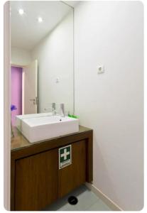 Koupelna v ubytování Porto Village Inn