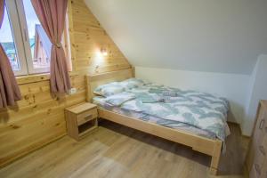 Letto o letti in una camera di Fenix