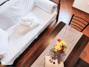 Ένα ή περισσότερα κρεβάτια σε δωμάτιο στο stone house / Evdilos Icaria (-50%)