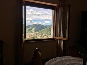 Nespecifikovaný výhled na hory nebo výhled na hory při pohledu z apartmánu + 27 fotografií