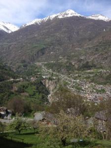 a view of a valley with snow covered mountains at Staldenried Ferienwohnung in Staldenried