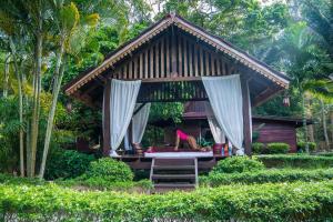 Ein Garten an der Unterkunft Leeloo Paradise