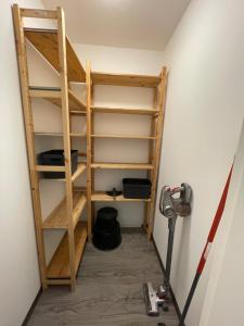 a ladder in the corner of a room at SWID Appartement in Delitzsch