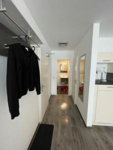 Kuchyň nebo kuchyňský kout v ubytování SWID Appartement