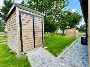Vonkajšia záhrada v ubytovaní COTTAGE 2chambres-piscine-mer-plages-pistes cyclables
