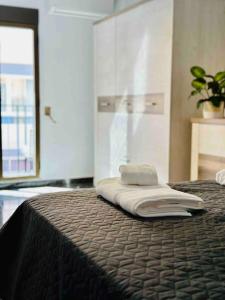 Łóżko lub łóżka w pokoju w obiekcie Playa Bonita Apartment