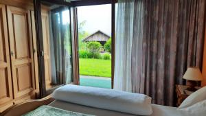 Postel nebo postele na pokoji v ubytování Gästehaus Post Aigner