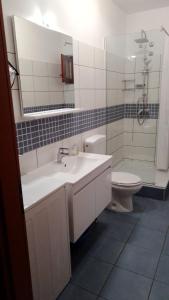 Kúpeľňa v ubytovaní Apartmani MW, Plavi apartman