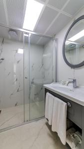 Ванная комната в Motto Premium Hotel&Spa