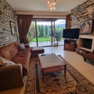 Телевизор и/или развлекательный центр в Villa Vigneto +12 фотографий