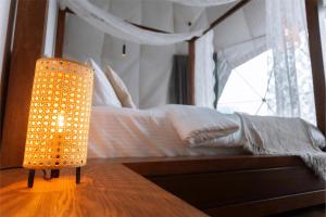 Voodi või voodid majutusasutuse Serene Glamping سيرين toas