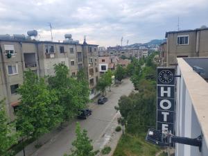 a view of a city street with a hotel sign at BS Hotel in Durrës